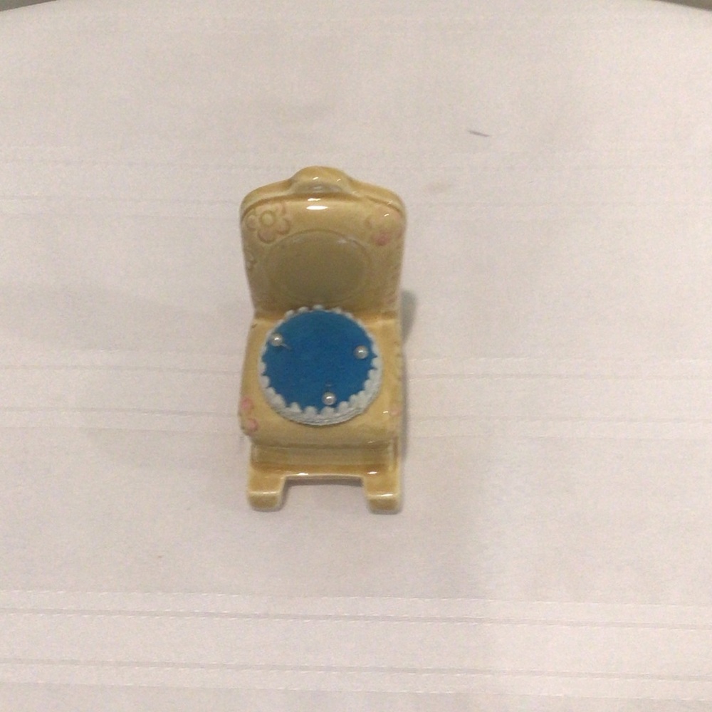 Yellow ceramic rocking chair pin cushion